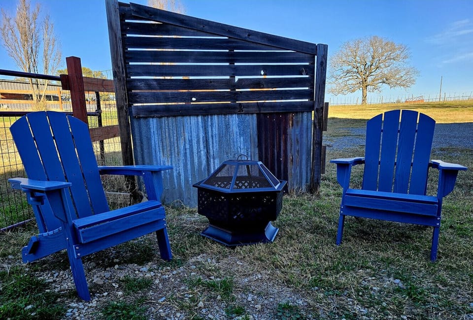 Relax around the wood burning fire while grilling dinner