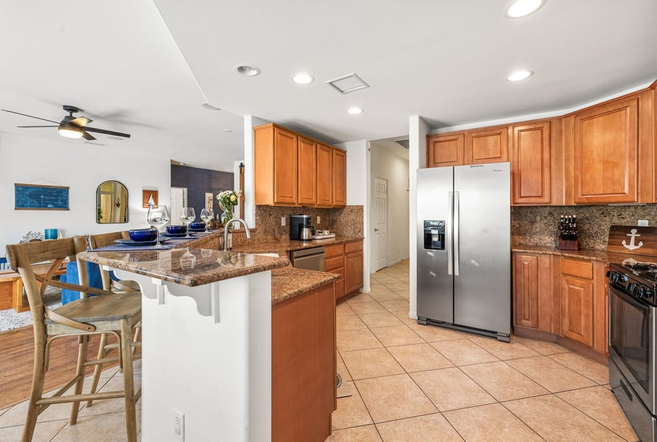 Fully stocked, open floorplan kitchen with drip coffee bar 
