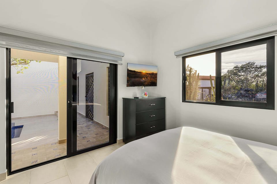 Comfortable courtyard bedroom designed for restful Baja nights.