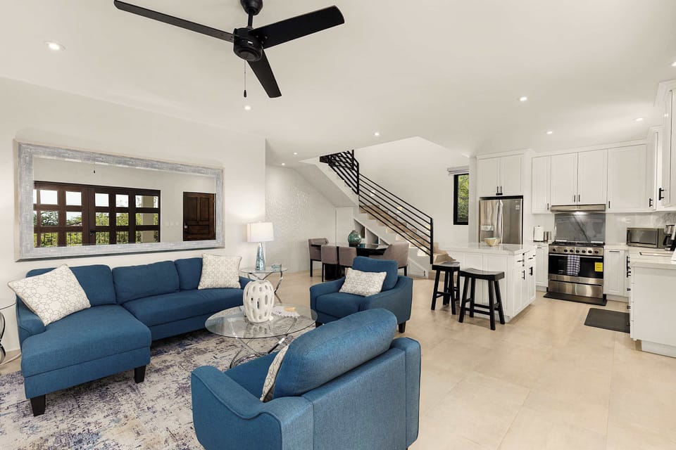 Bright and cozy living room on the lower floor of this Tezal villa.