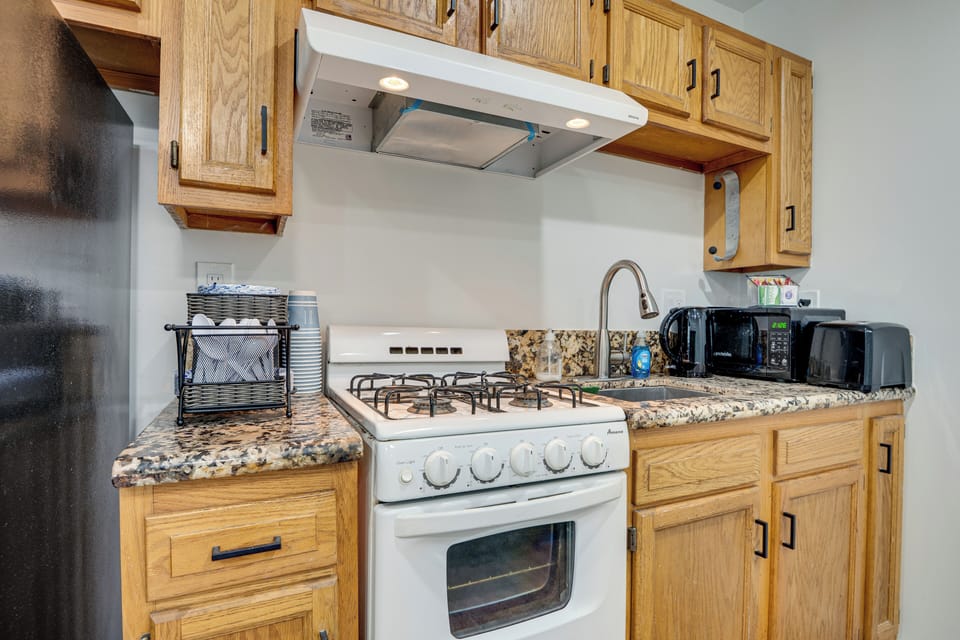 Kitchen | Single-Story Studio Apartment | Central Heating & A/C