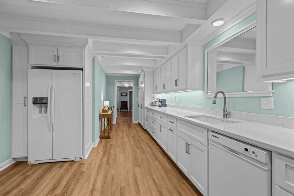Large, fully equipped kitchen with abundant counter space and all the tools needed for cooking, entertaining, and family-style dining.