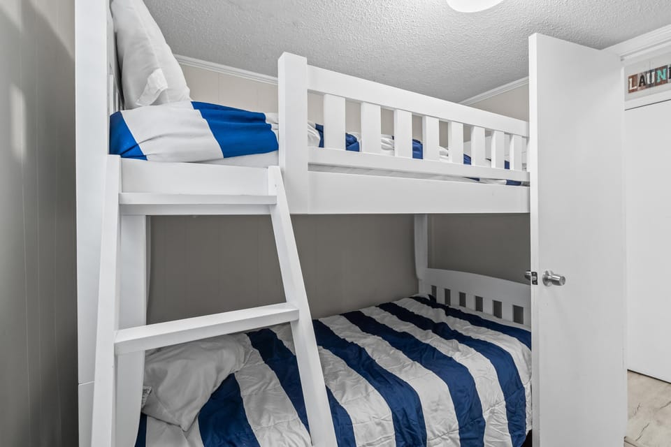 Cozy bunk bedroom with crisp linens for restful nights
