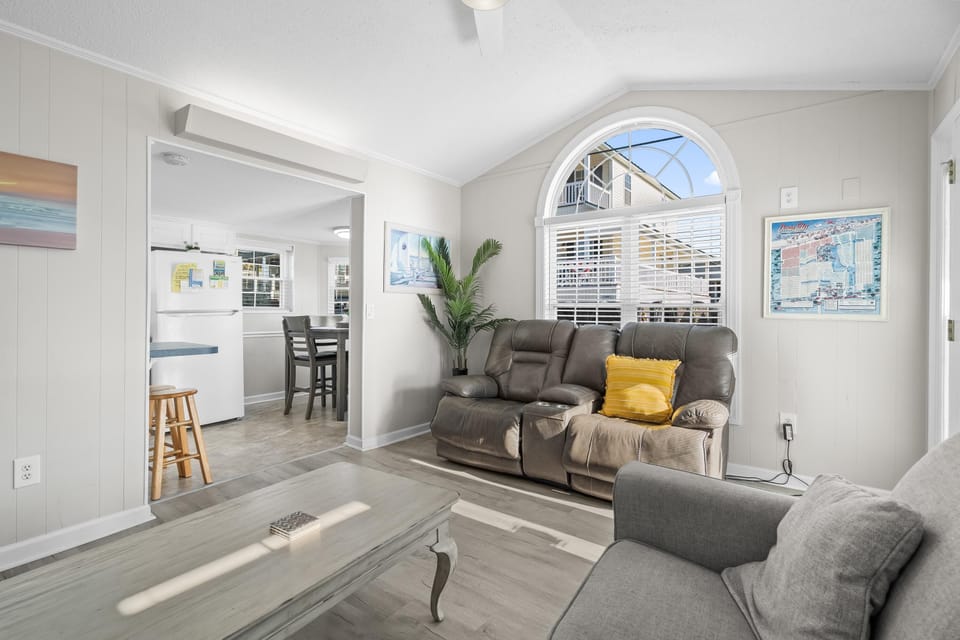 Bright and airy living room with cozy seating and natural light