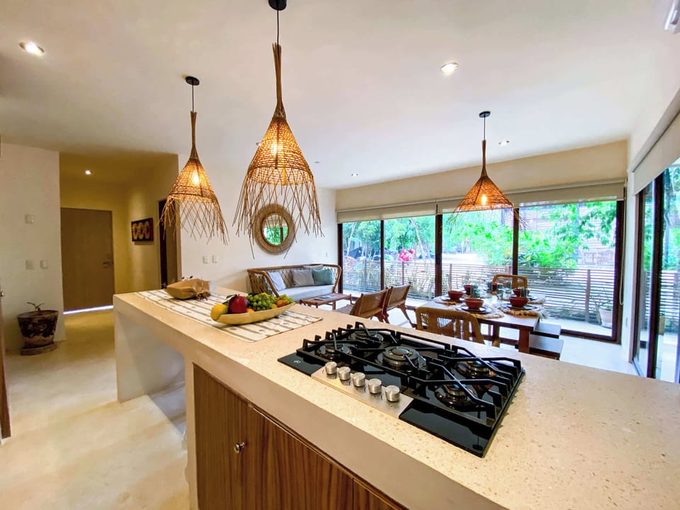 Equipped kitchen with outdoor pools 