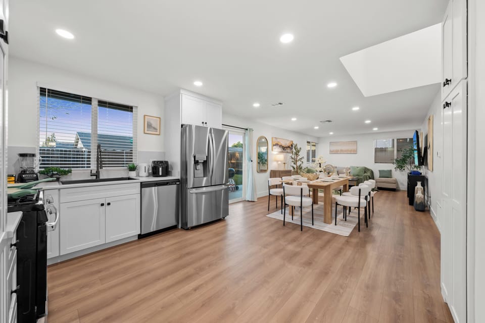 Spacious kitchen next to dining area for easy cooking and meals.