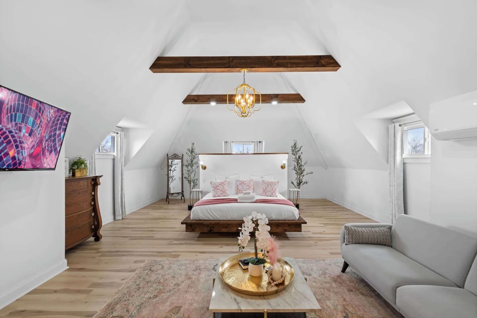 Bedroom 1: A roomy, girly bedroom with a plush king-size bed for ultimate comfort.