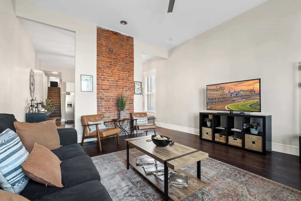 Living Room: Bright and cozy living room perfect for relaxing after a long day.