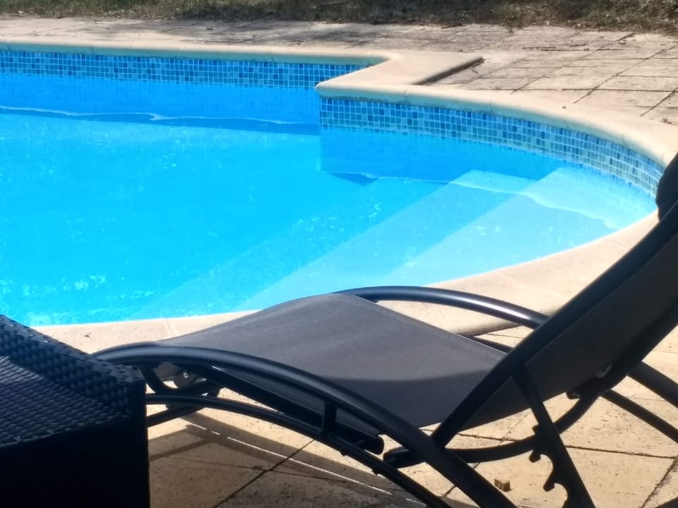 Large heated pool. Sunloungers and towels provided