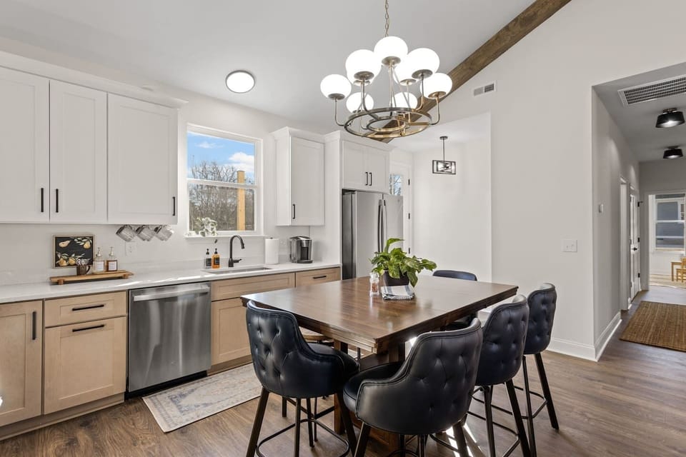 Our kitchen + dining area with seating for 5. 