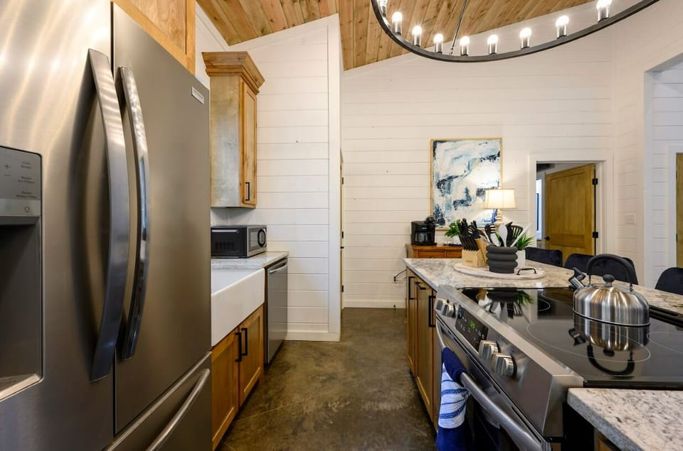 Full-size stainless appliances and a thoughtfully designed layout that makes meal prep effortless.