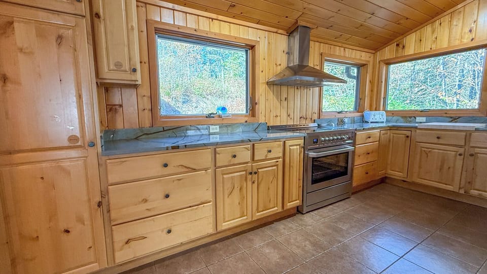 The spacious kitchen has stainless steel appliances.