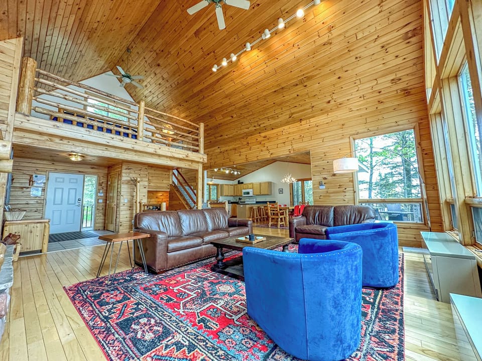 Looking up to the loft bedroom from the living room.
