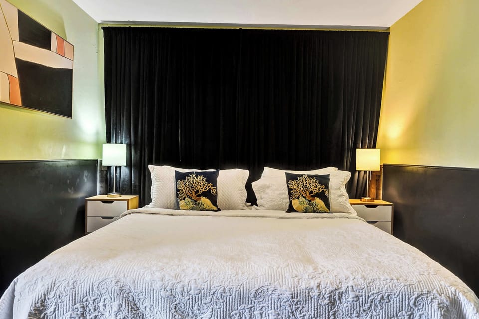 A plush king bed & smart TV are available in the bedroom retreat​