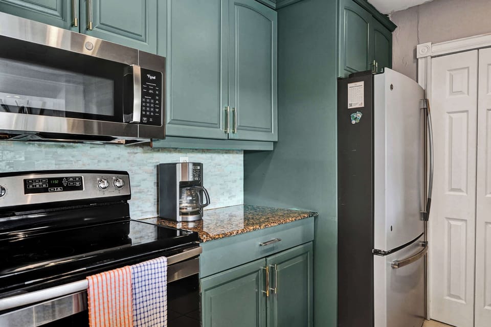 Unit 1’s inviting kitchen is well equipped for an unforgettable getaway​​