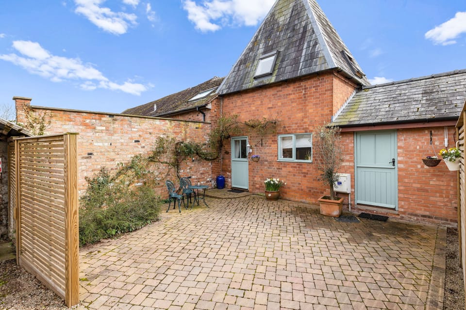 Outside, there's ample private parking in the courtyard