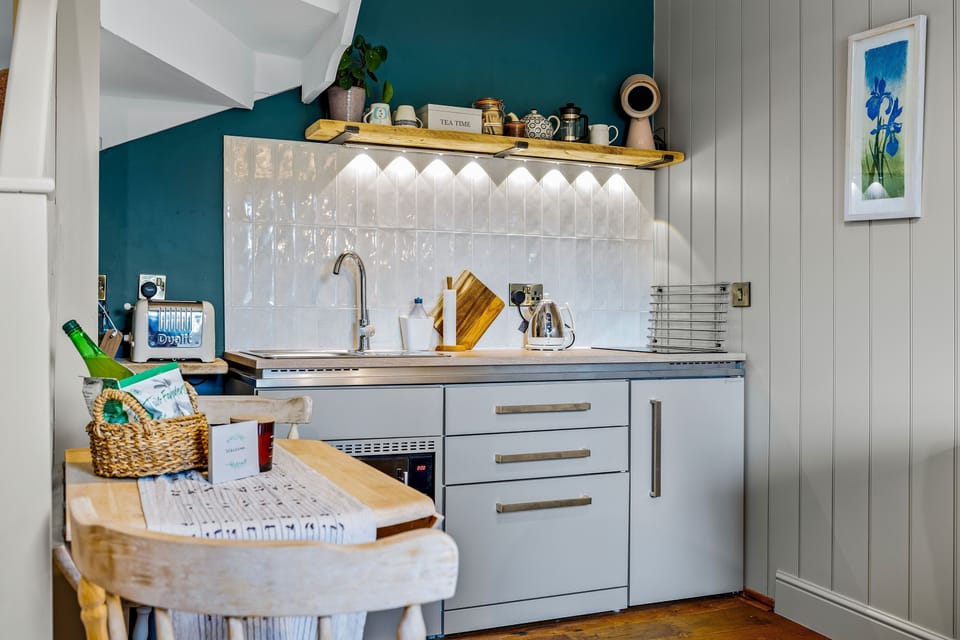A dinky kitchenette is well-equipped for dining in. If the weather is kind, it is well worth planning an evening on the south-facing terrace sipping wine as the BBQ smoke swirls in the corner of your terrace