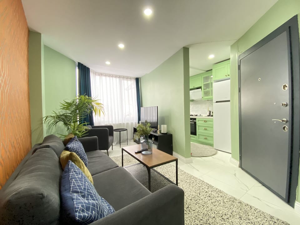Modern living room with bold colors and a welcoming vibe.