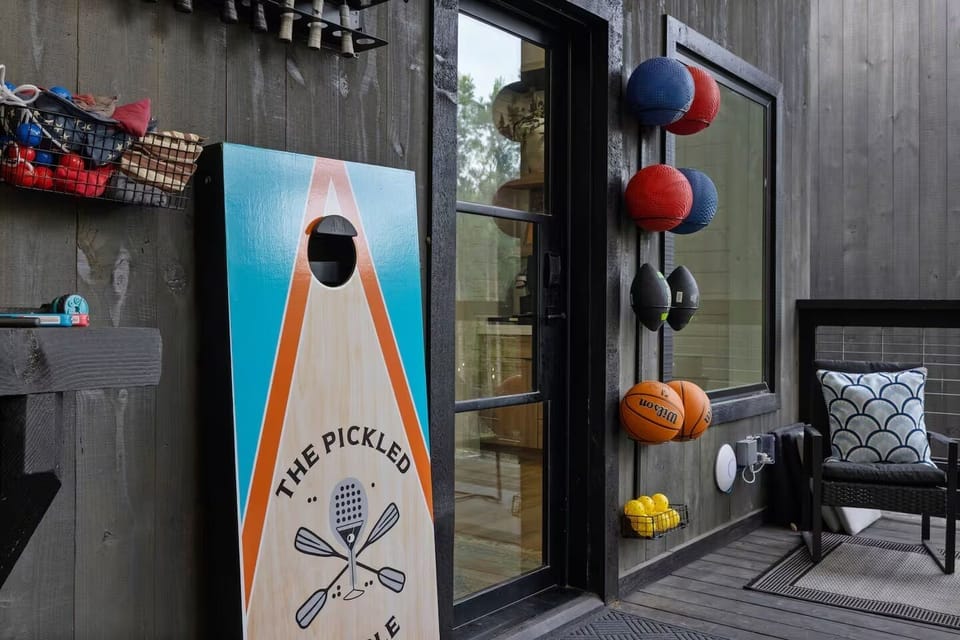 Outdoor Game Zone: Play cornhole or shoot hoops while soaking up the sun in style!