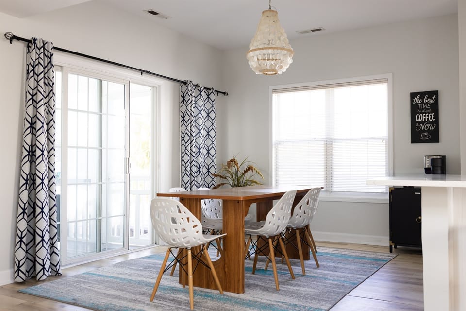 Bright, breezy and made for lazy coastal mornings - the living room at Hola Beaches welcomes everyone in