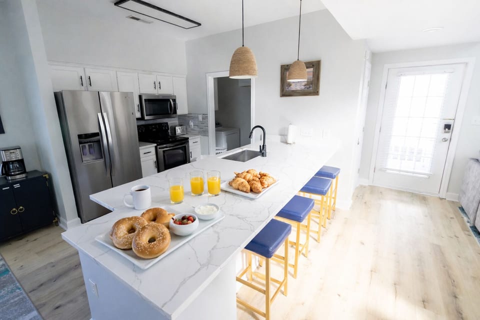 Slow mornings, fresh coffee and bagels in the kitchen before a big day at the beach