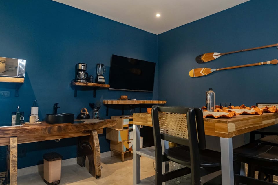 Wooden dining room with TV