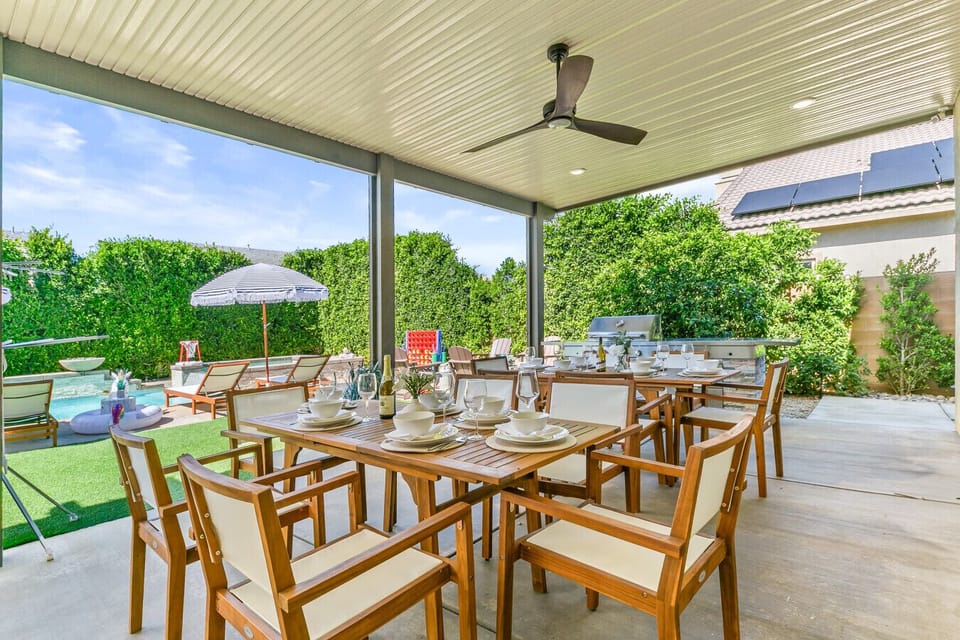 Gather the whole group to enjoy outdoor meals prepared on the built-in BBQ in this spacious patio dining area