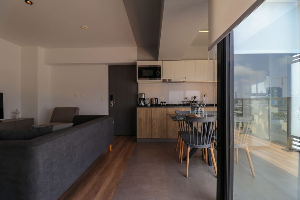Open kitchen with bar seating