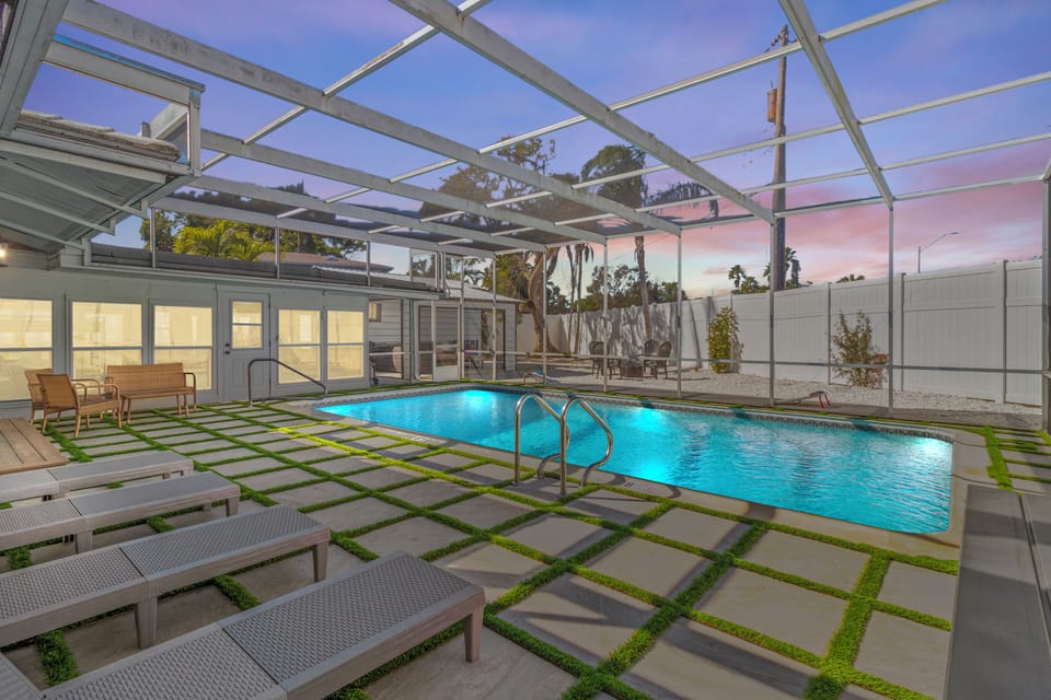 Private Heated Salt water pool with Screened lanai and custom surround