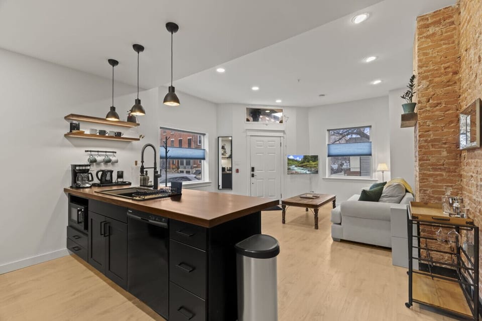 Open kitchen with island—perfect for morning coffee or home-cooked meals.