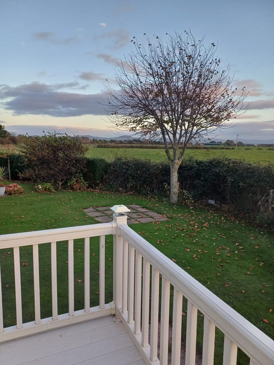 Wraparound decking on this stunning caravan in Wales. Enjoy spectacular views of the welsh countryside from your private retreat on Ty Mawr Holiday Park
