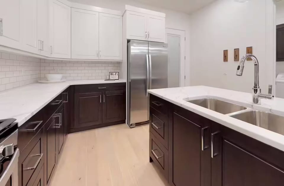Spacious Kitchen Fully Stocked With Everything You Would Need For Cooking Meals During Your Stay 