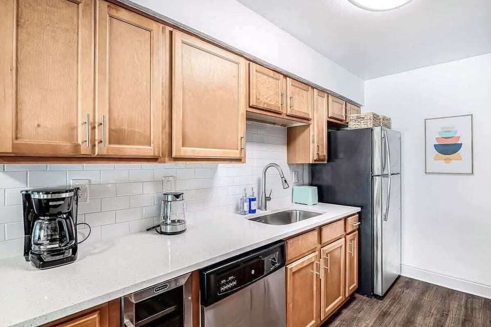 Fully equipped kitchen with modern appliances, spacious counters, and everything you need for home style meals.