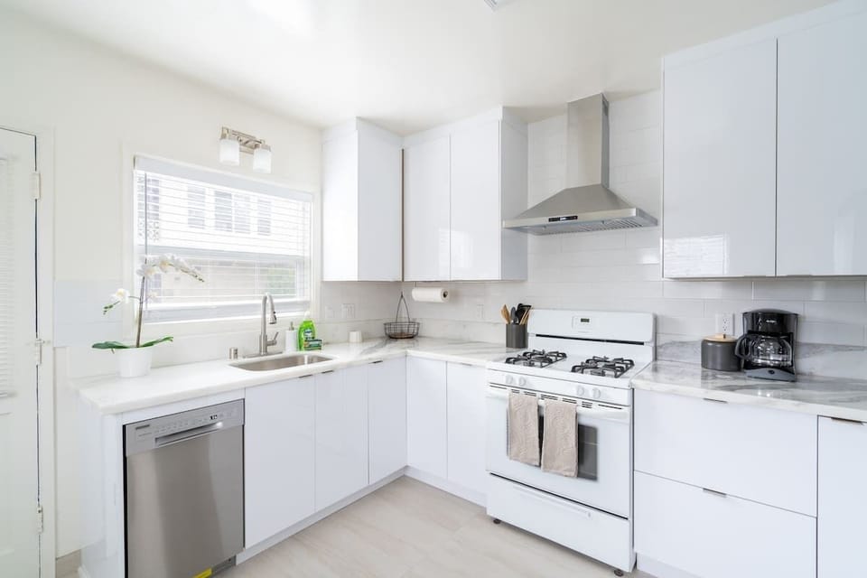 The bright kitchen comes fully equipped with everything you need