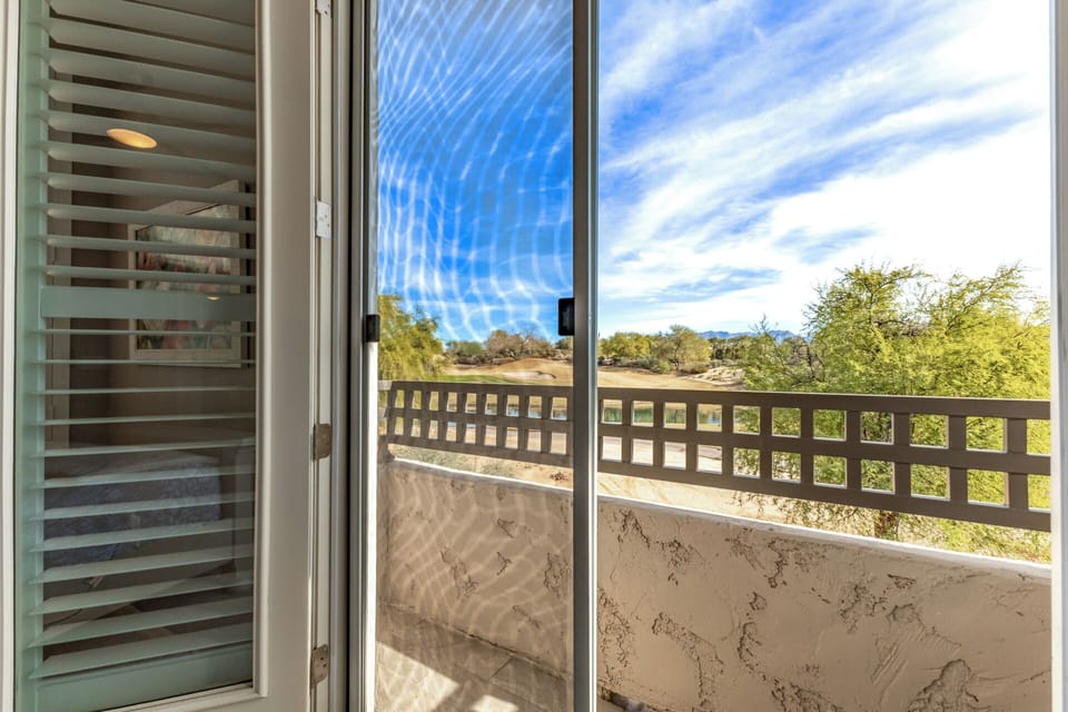 Wake up to natural light and a view of the green.