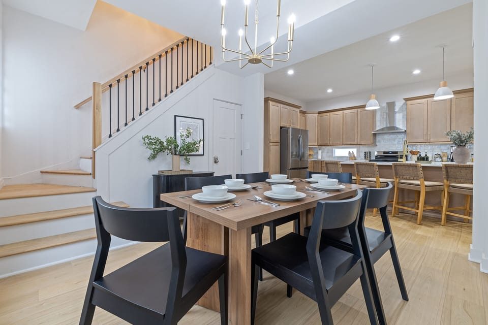 Gather around a bright, welcoming dining space made for sharing meals.