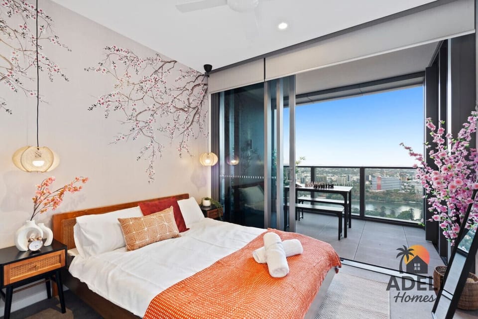 The humble Cherry Blossom inspires our room to bring you serenity and sanctuary.Rest on Japanese Tatami (low bed), watch the tranquil views of the river, city skyline, and Mount Coot-tha, or light the room with the Remote-controlled ceiling lamps.