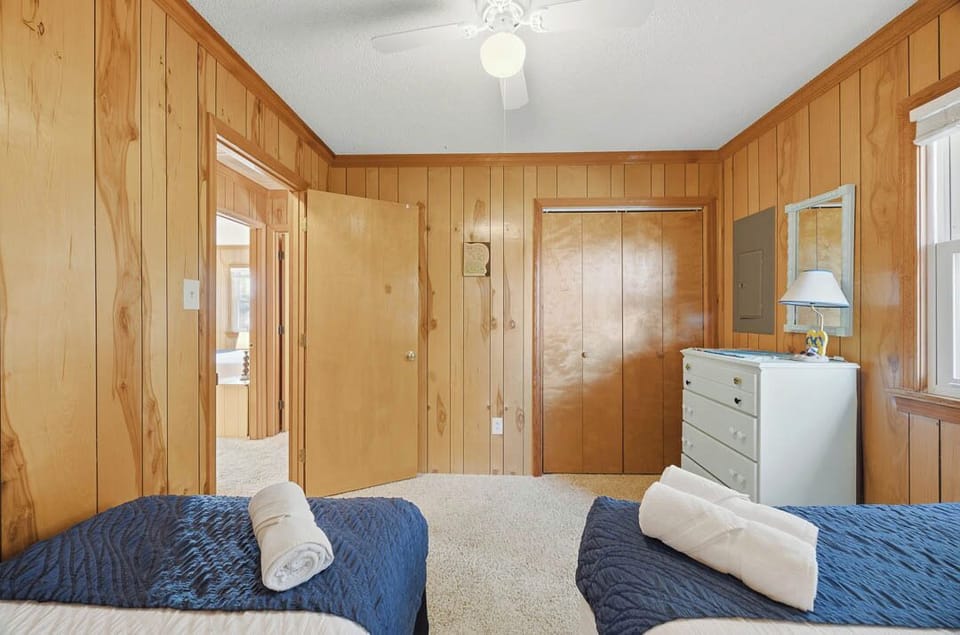 Top-Level Bedroom with Full Bed and Twin Bed