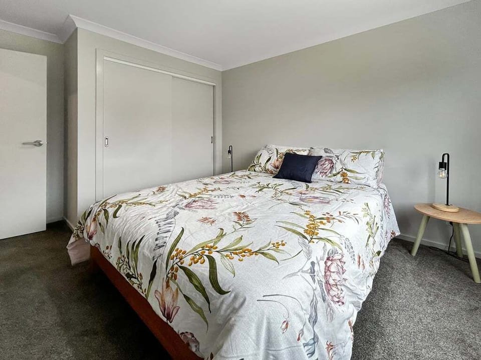 Dream away in the plush queen size bed