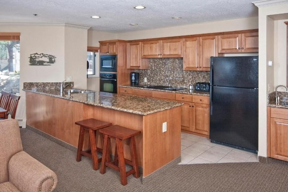 Cook together in a full kitchen with generous granite counters