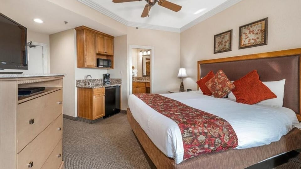 Settle in with a plush bed and handy in-room kitchenette.