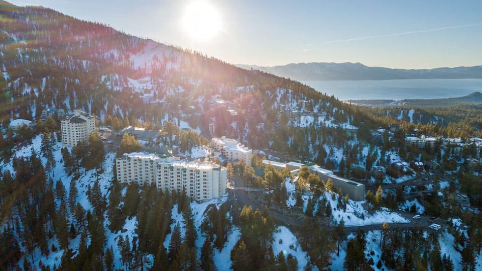 Breathe in alpine serenity with lake views and sunrise glow.