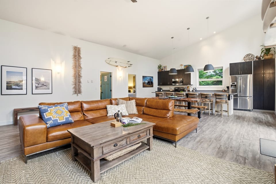 Open concept space to dining table and kitchen