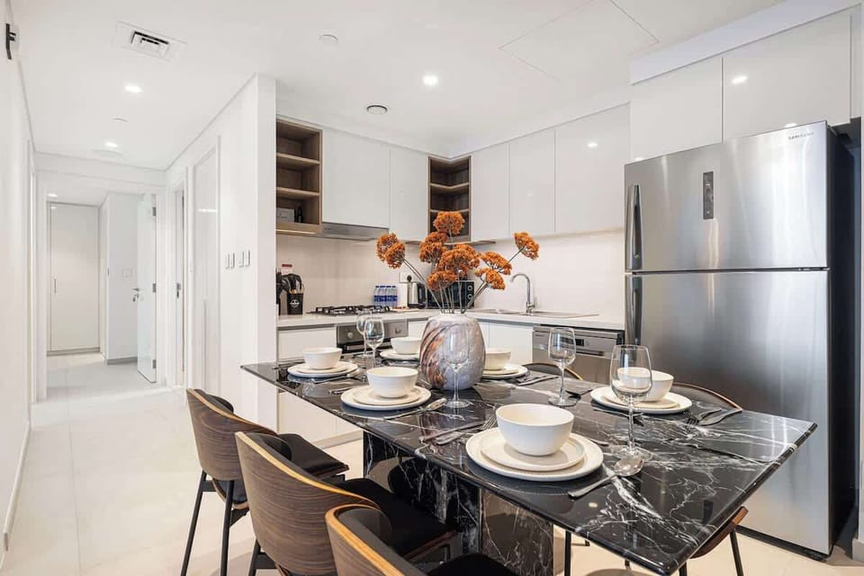 Modern, airy space with kitchen and inviting dining area