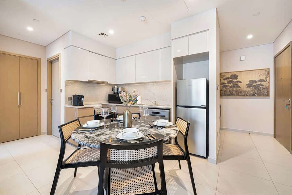 Bright dining area perfect for meals, with open views of the living room and the kitchen