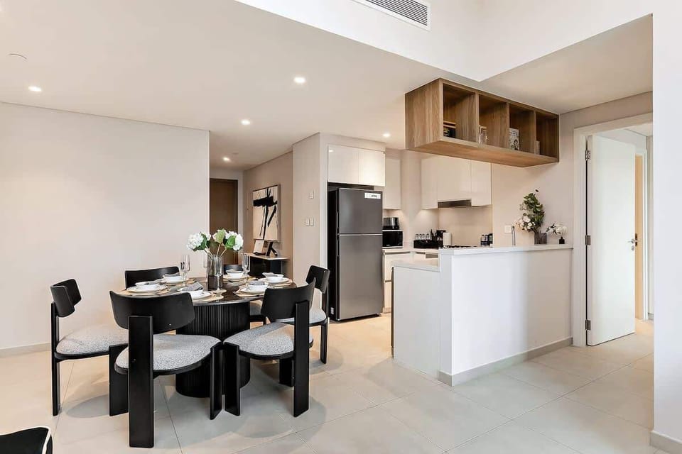Open layout with a spacious dining area as the focal point, complemented by a modern kitchen with gas appliances