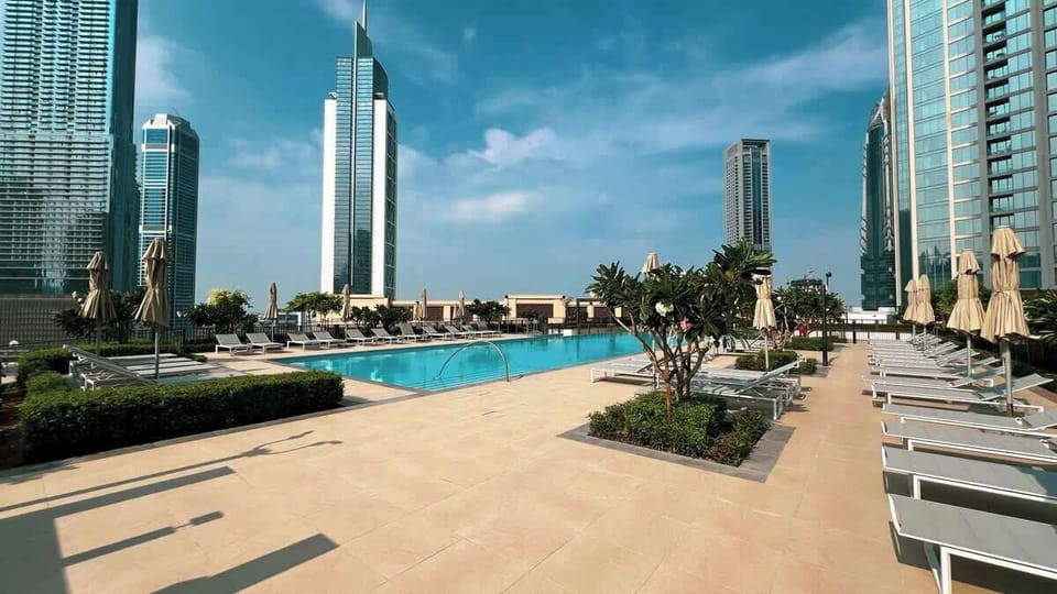 Soak up the sun on comfortable lounge chairs by the sparkling outdoor pool, or unwind in the stylish common area