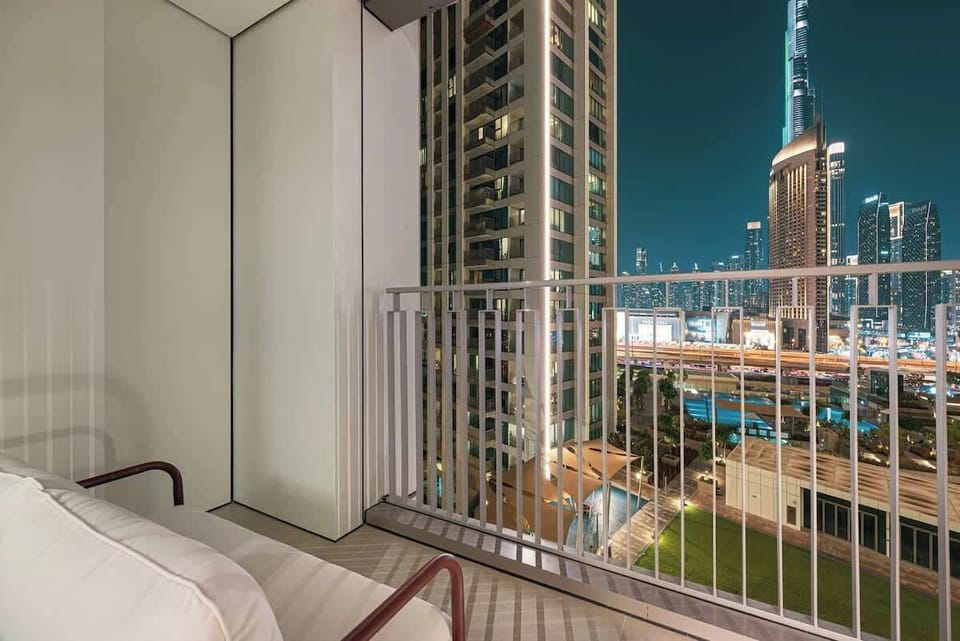 Sip a drink under the stars with panoramic views of Downtown at night