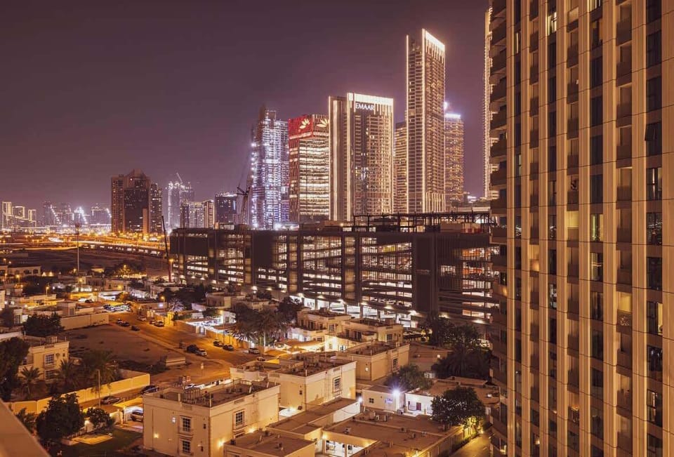 Stunning city lights and illuminated streets captured in a nighttime panorama