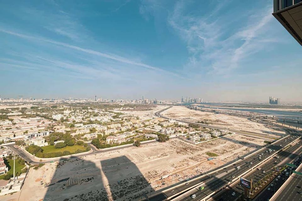 Sunlight casts soft shadows over Dubai’s famous towers, making the skyline shine